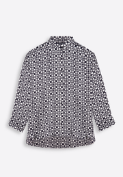 Black and white geometric printed shirt on plain background, East Vibe
