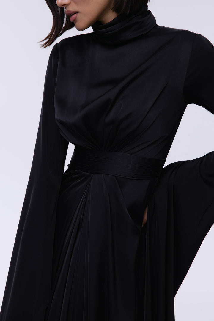 Black long-sleeve dress with a high neckline on a white background