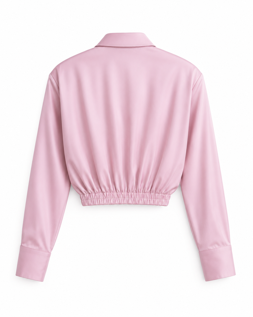 Pink long-sleeve crop top on a white background