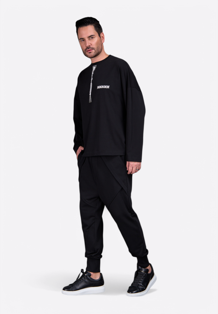 Black men’s sweatshirt with white tassel and EV monogram by East Vibe