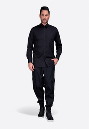 Model wearing formal black cotton shirt with button-down style East Vibe