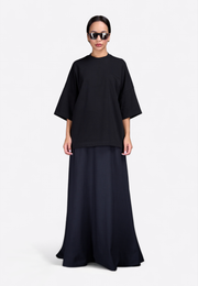 Model wearing crewneck oversized T-shirt with tassel, front view – East Vibe
