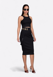 Model wearing EV monogram pencil skirt with strap, front view – East Vibe
