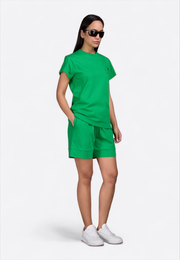 Model wearing high waist green shorts, front view – East Vibe
