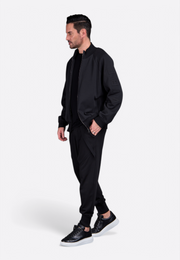 Model wearing EV Signature black zipper sweatshirt by East Vibe