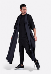 Model wearing long black cotton scarf by East Vibe