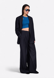 Front angled view of black notch lapel blazer, East Vibe
