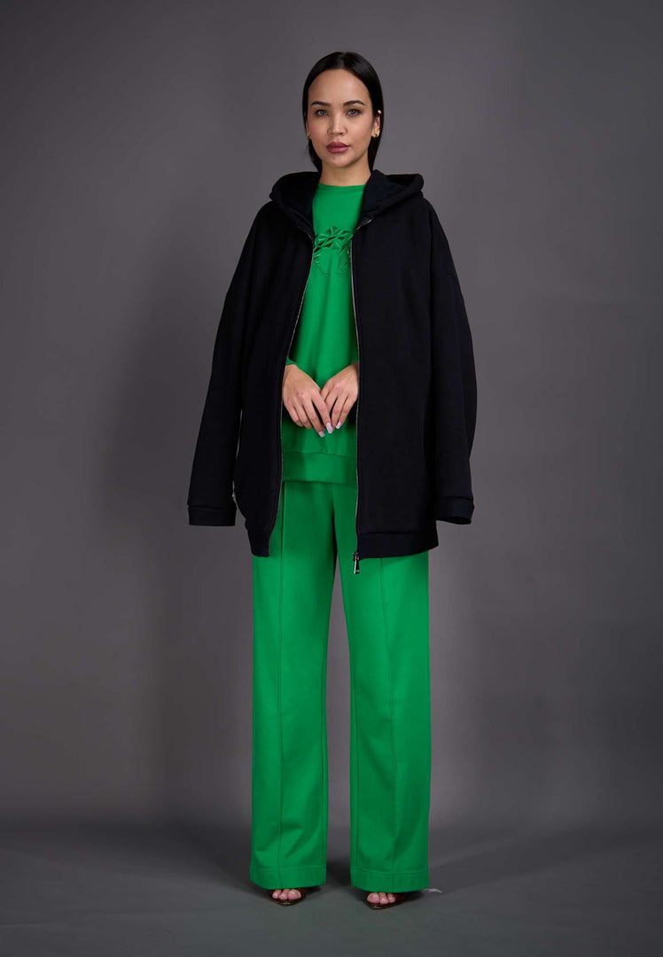 Model wearing black habaya with relaxed modern silhouette