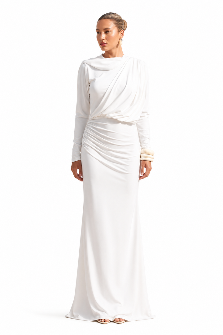 woman wearing Seraphine white draped maxi dress by East Vibe
