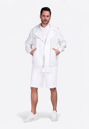 Model wearing signature white zipper jacket by East Vibe