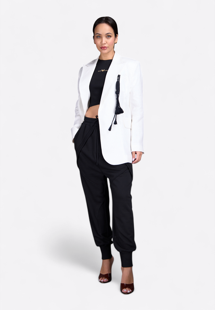 Model wearing white blazer with tassel detailing, front view – East Vibe
