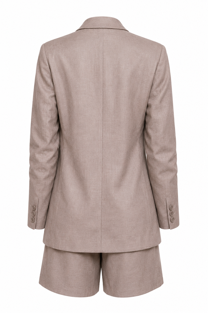 Beige suit jacket and shorts set on a white background