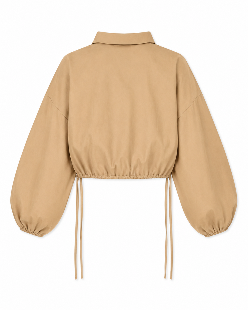 Beige jacket with balloon sleeves on a white background