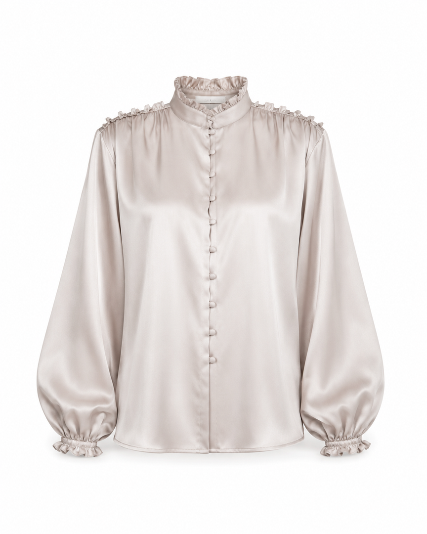 Silky blouse with long sleeves on a white background
