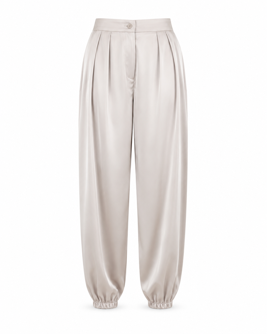 Beige satin pants on a white background