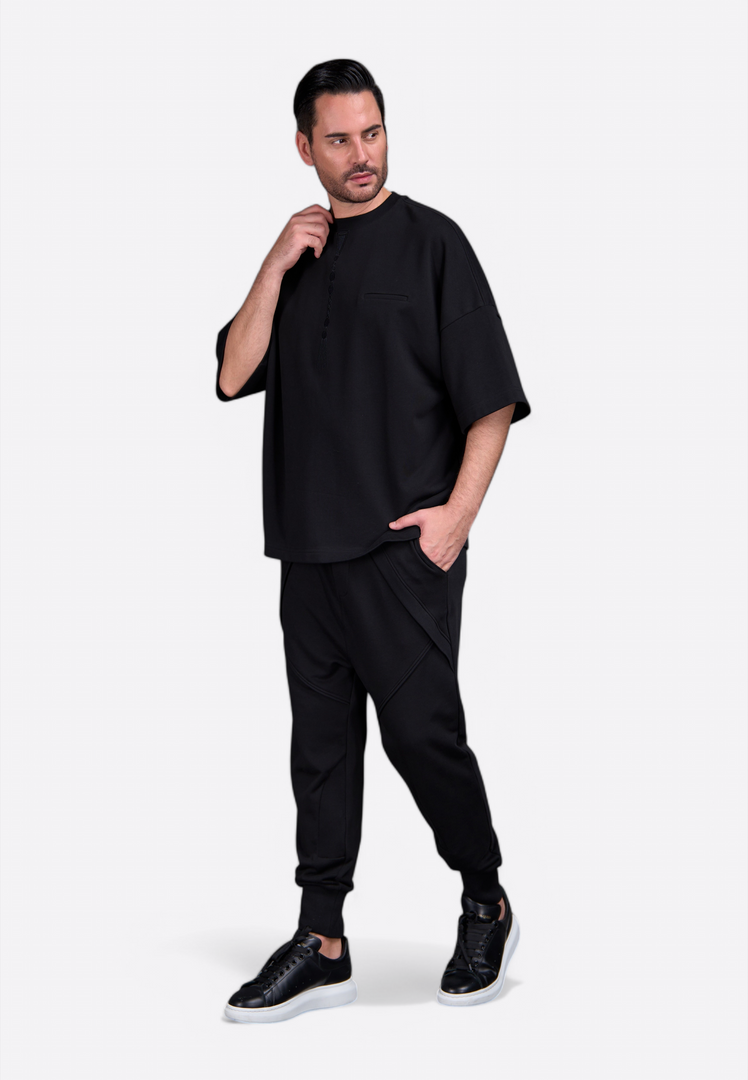 Oversized black cotton t-shirt with tassel design by East Vibe